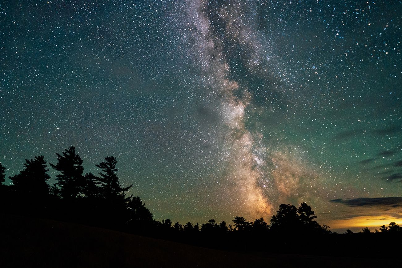 Blue lights and many stars in the sky. 